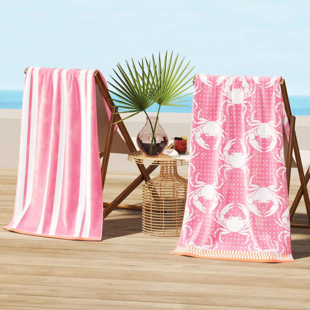 Maui Cotton Velour Beach Towel in vibrant green designs displayed on a chair by the beach.
