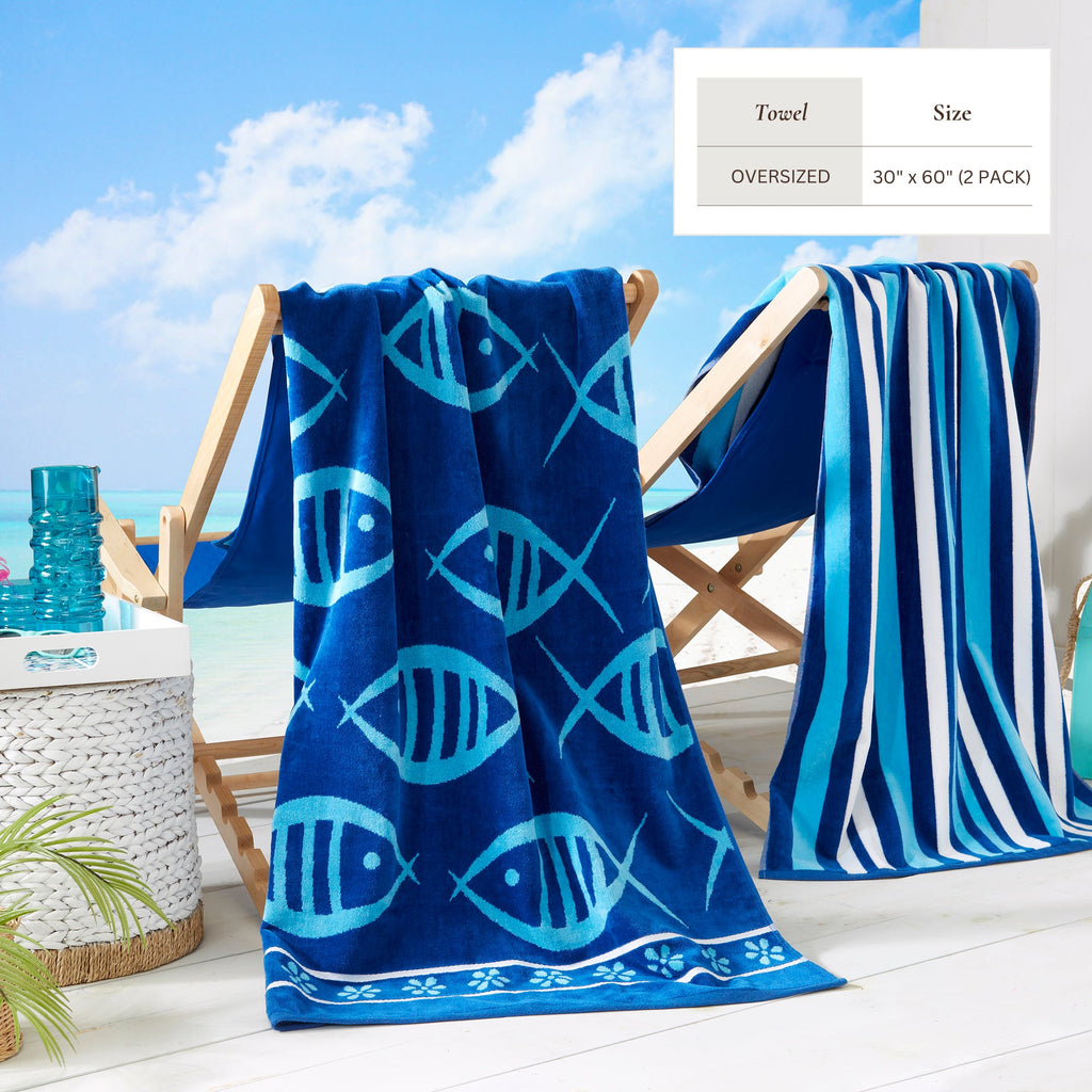 Maui Cotton Velour Beach Towel in vibrant green designs displayed on a chair by the beach.