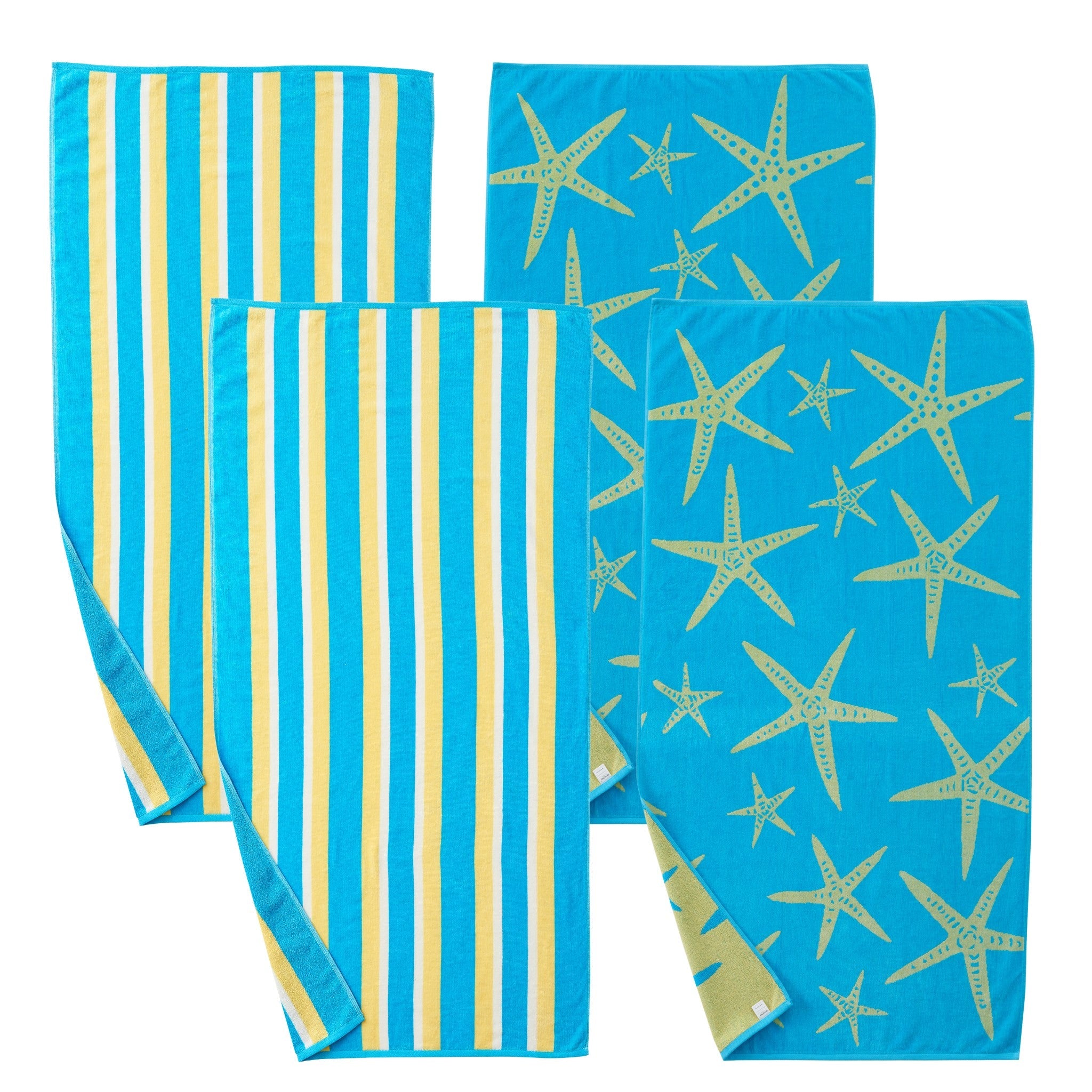 Maui Cotton Velour Beach Towel in vibrant green designs displayed on a chair by the beach.