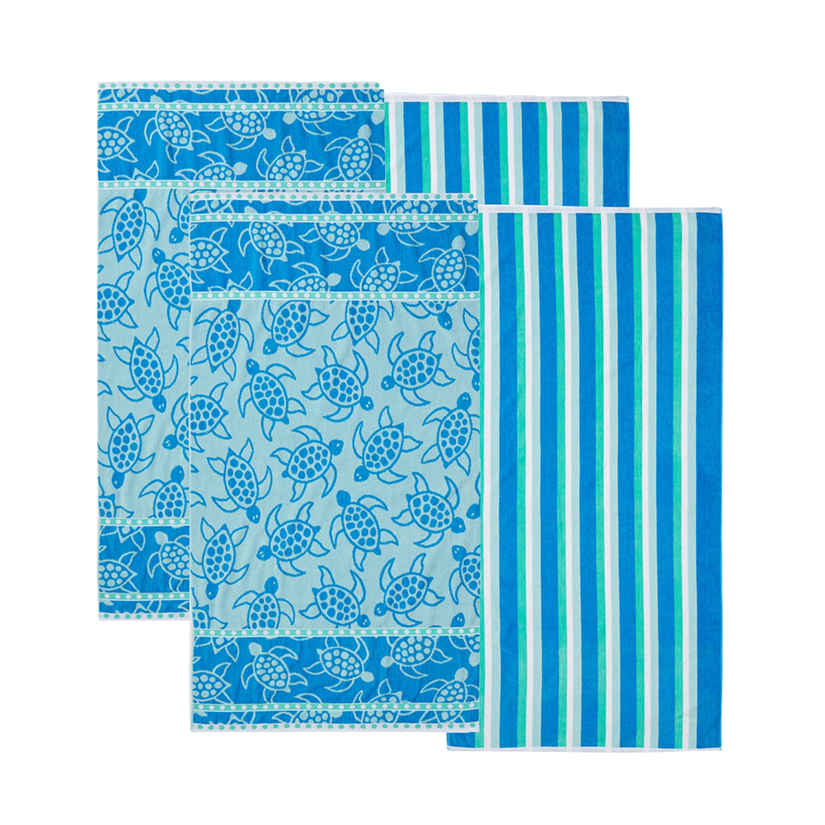 Maui Cotton Velour Beach Towel in vibrant green designs displayed on a chair by the beach.