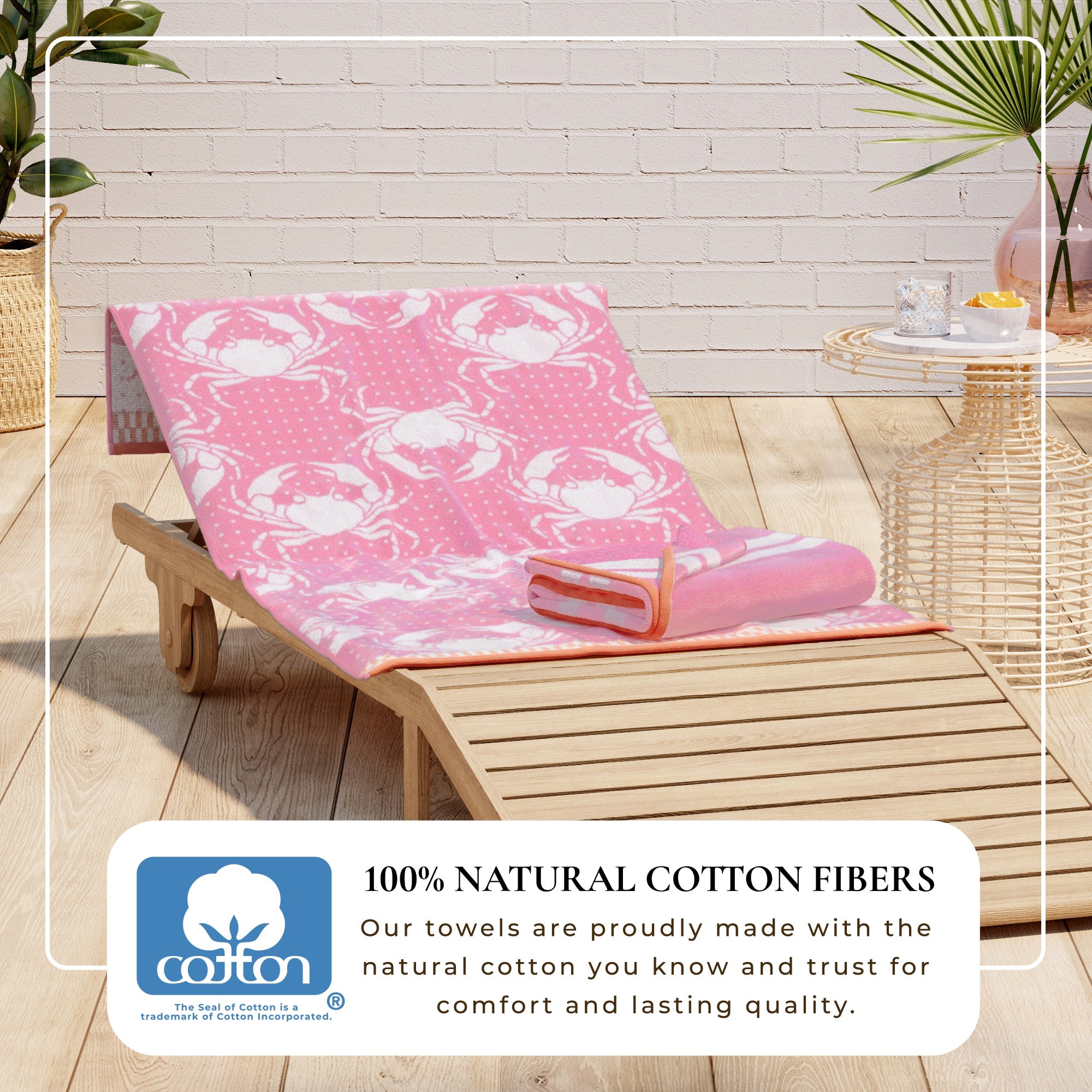 Maui Cotton Velour Beach Towel in vibrant green designs displayed on a chair by the beach.